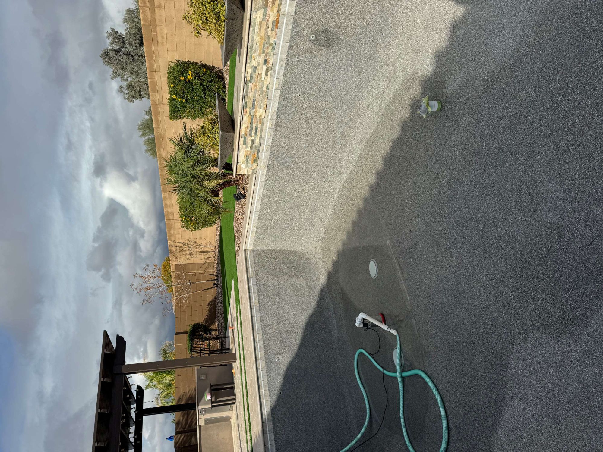 Clean backyard swimming pool maintained by Tartan Pools in Mesa, AZ