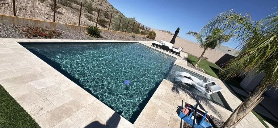 Crystal clear pool water after weekly service in a Queen Creek, Arizona backyard