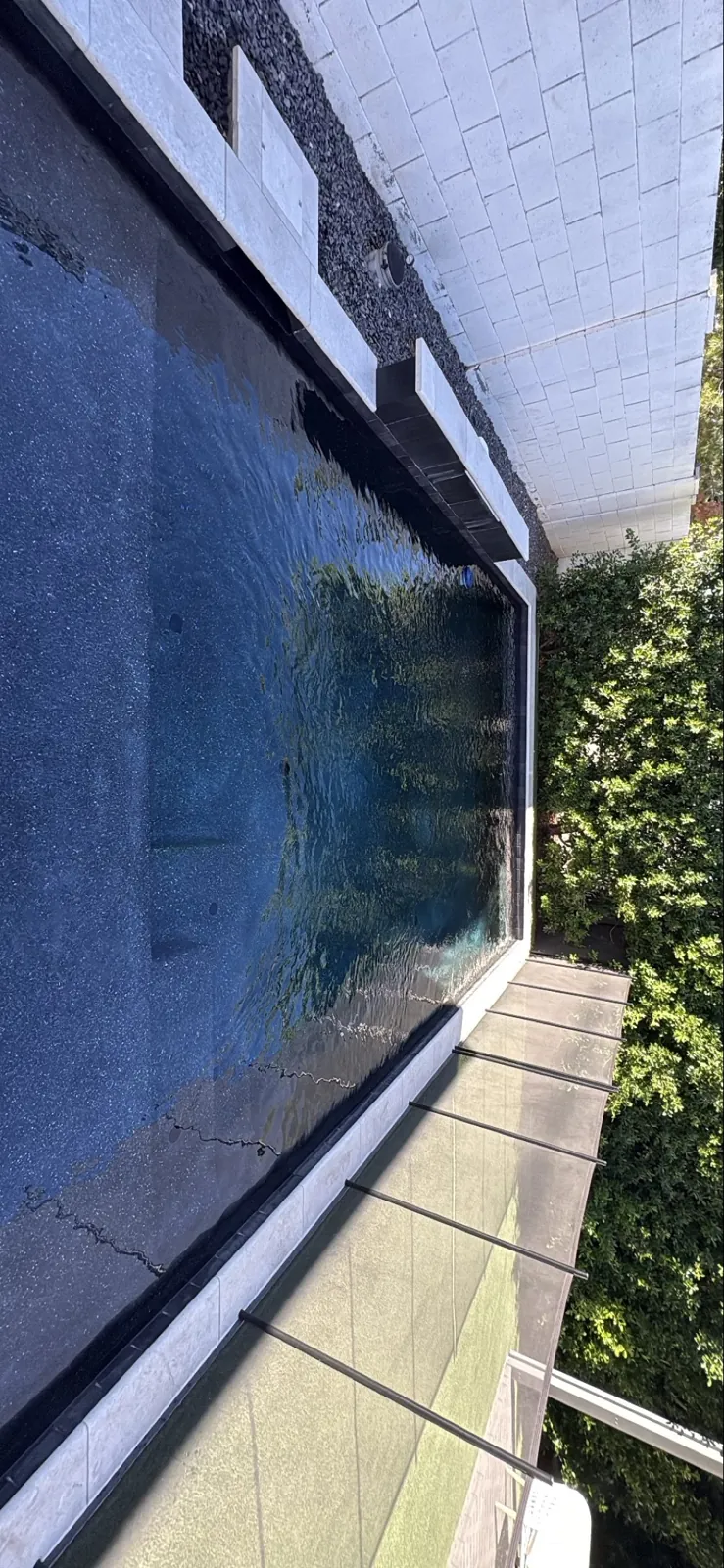 Vanishing-edge style sheeting water feature on a pool in Queen Creek, Arizona
